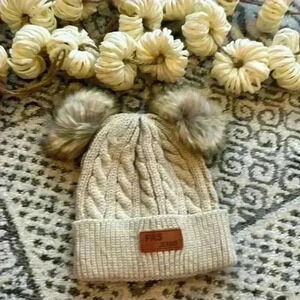 Knit tan hat with faux fur Pom Poms